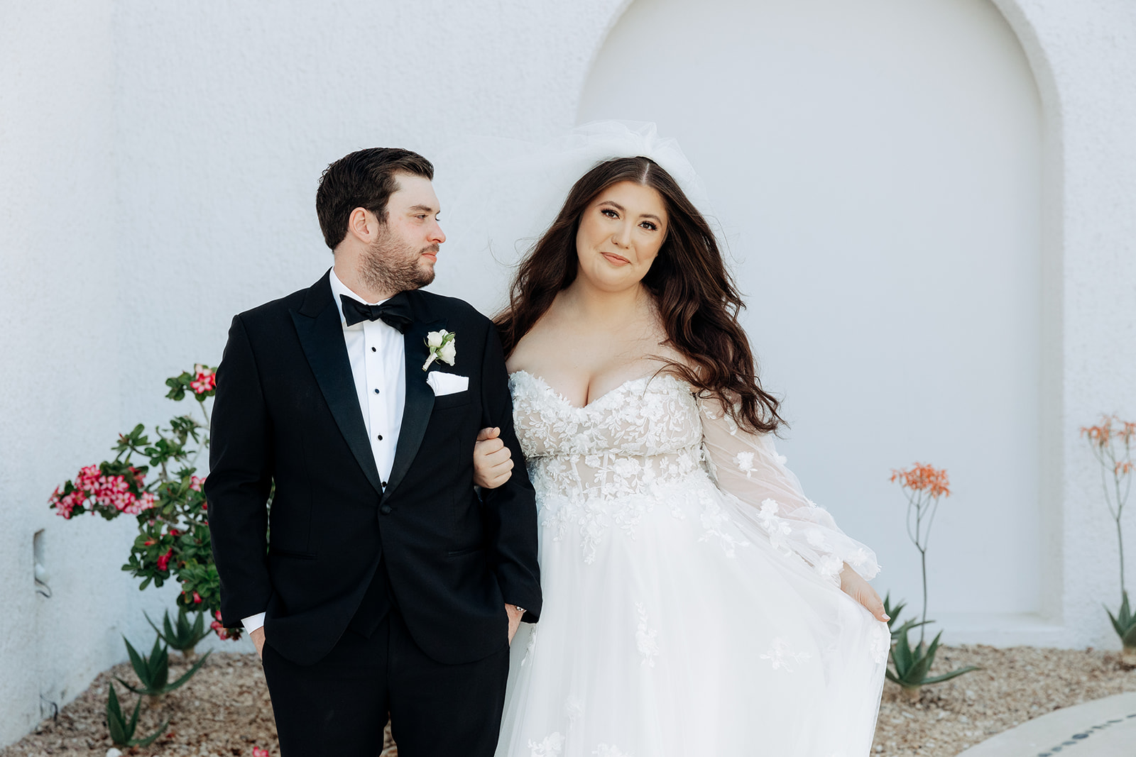 Luxury destination wedding ceremony at Marquis Los Cabos planned by BWEDDINGS, featuring an elegant oceanfront setup for a Chicago couple celebrating in Cabo San Lucas.